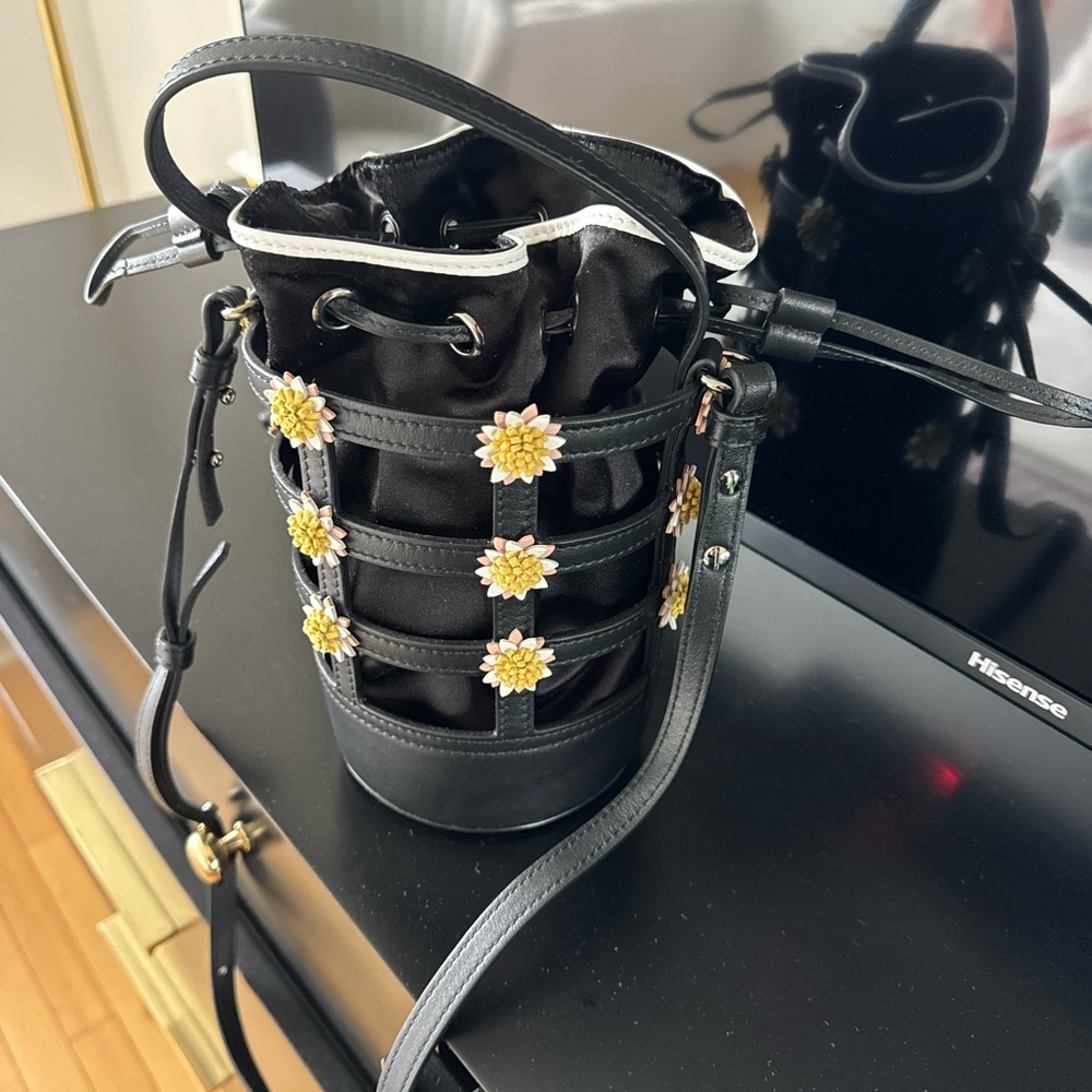 Elegant Black Bucket Bag with Floral Accents